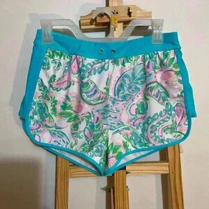 Women’s swim shorts, paisley designs,size medium ,nwnt